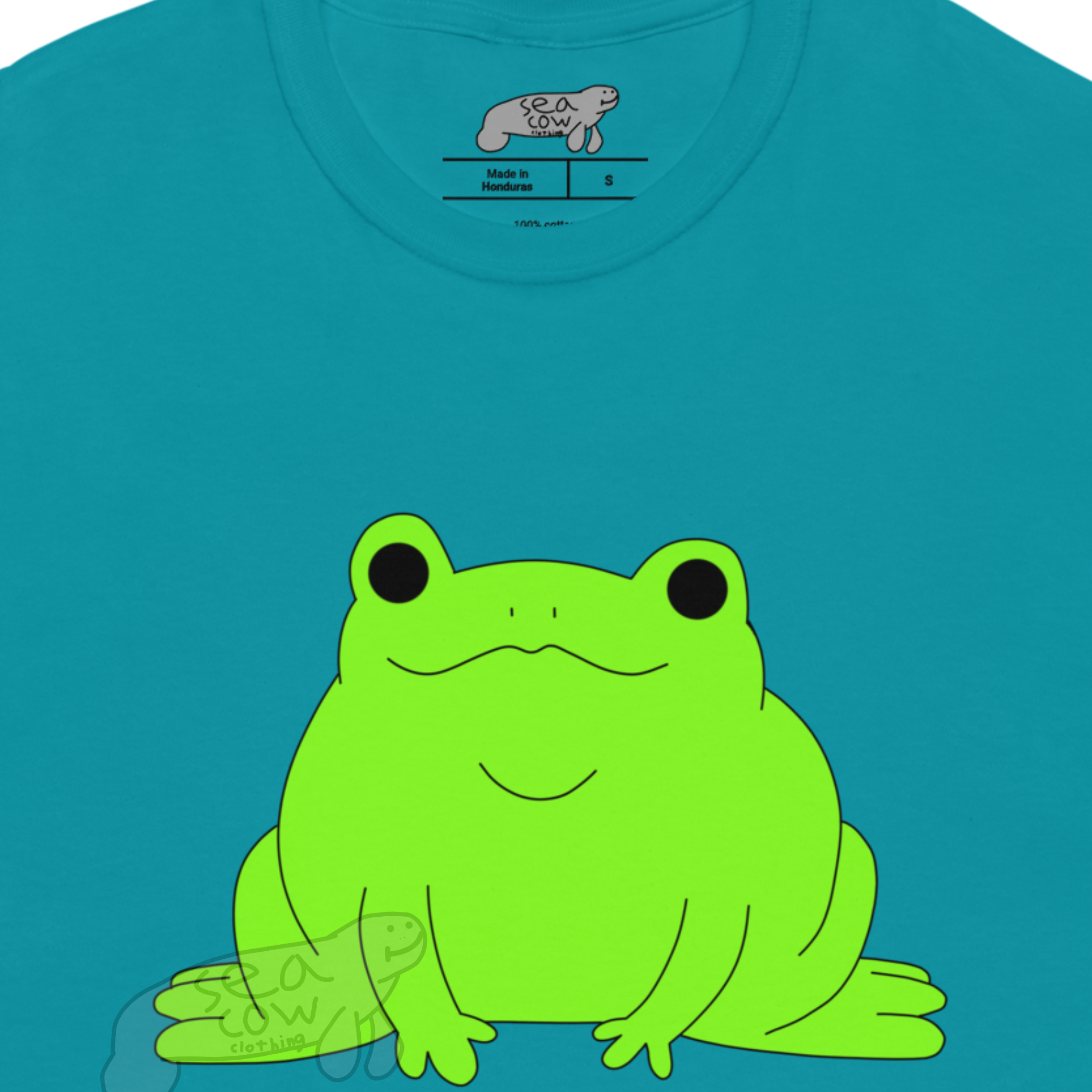 Blue t-shirt with a green frog graphic on a white background